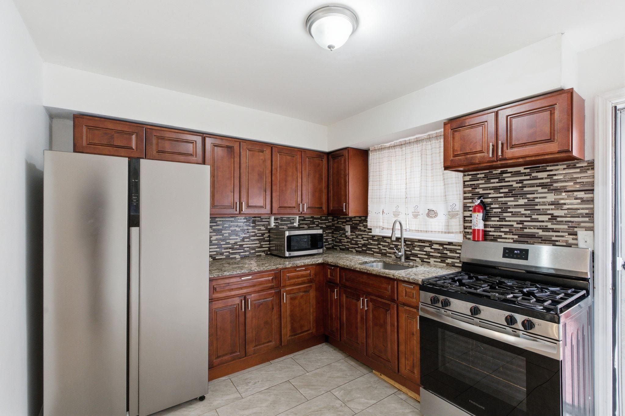 8 VAN NOSTRAND Avenue, Jersey City, JC Greenville, NJ 07305 - Property photo 3 of 17